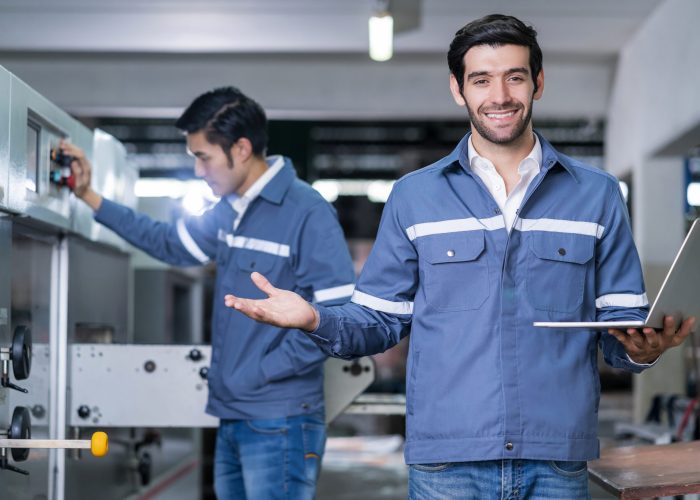 supervisor manager male engineer worker wears uniform working hand use laptop stock checking store warehouse shipping industrial team with safety uniform checking quantity product shelf